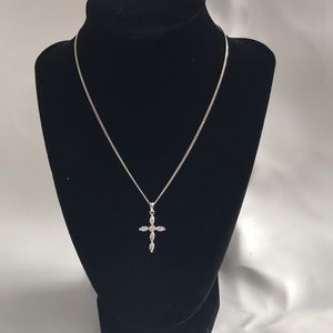 NWT Claire’s clear gem cross necklace.
